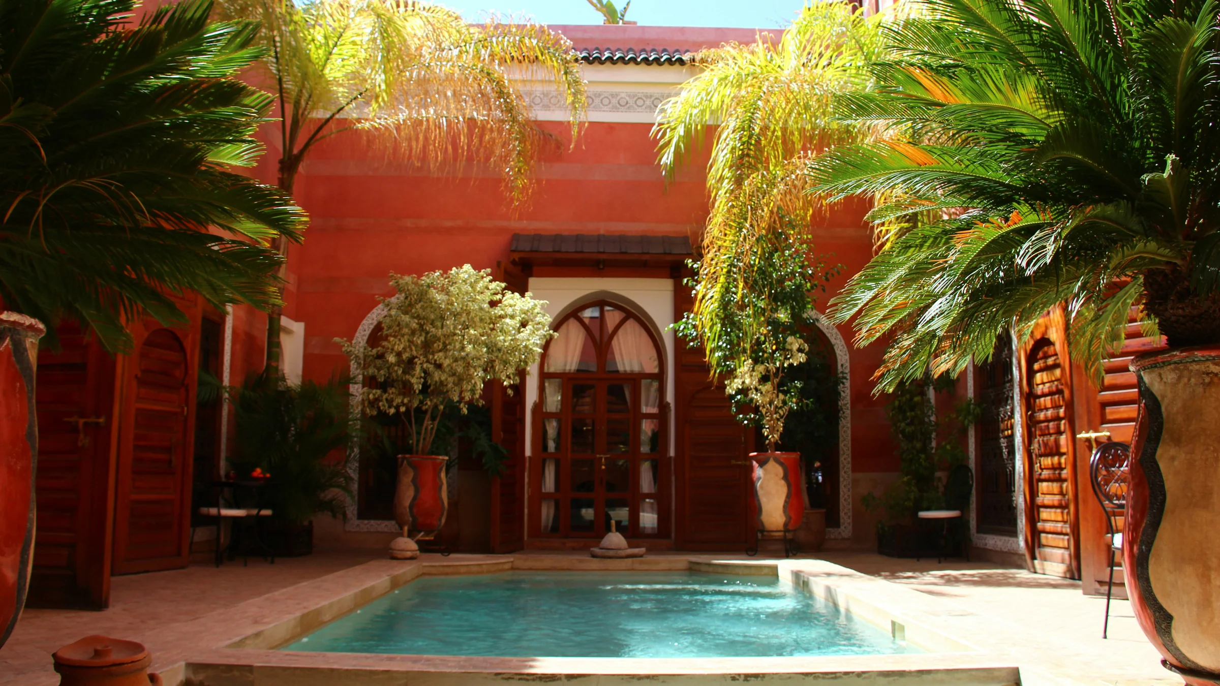 Riad El Fenn Marrakech — courtyard and medina rooflines