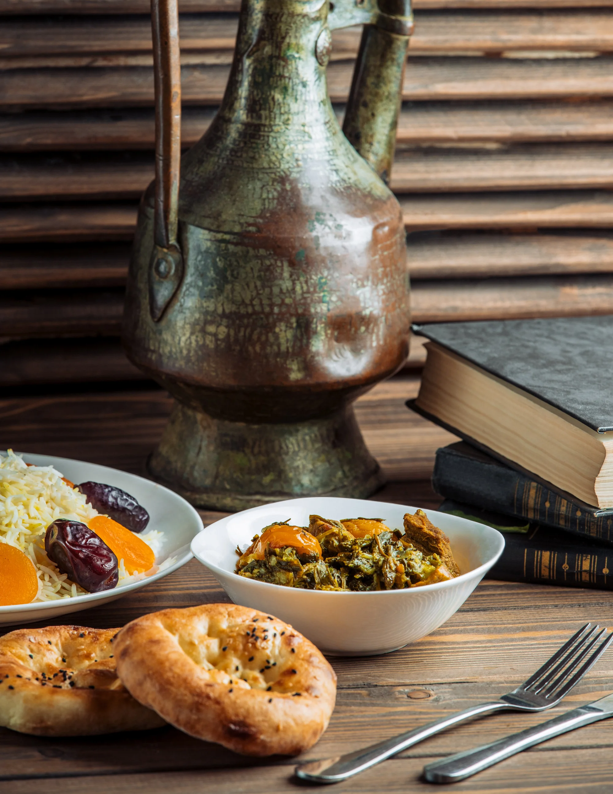 A shared meal spread for many — the moment Trepic's expense settler quietly does the math.
